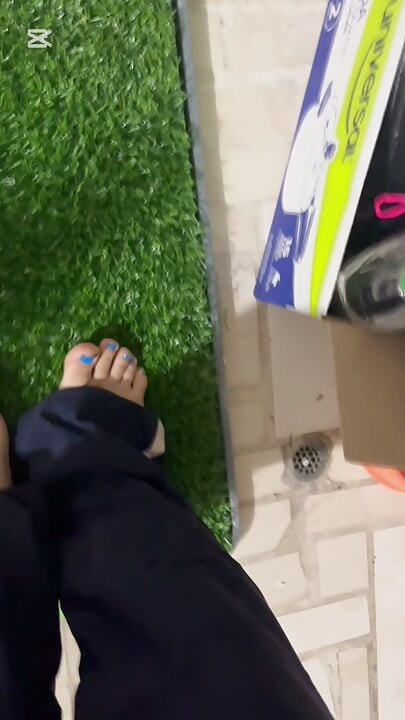Dirty feet in grass