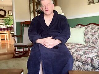 Daddy Dressed in a robe strips naked and masturbates