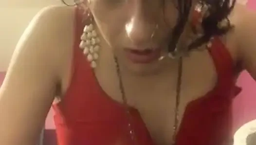Cute Latina Transgirl in Fishnets & Red Heels Puts On Small Pink Leashed Chastity & Sucks Dildo, As Usual