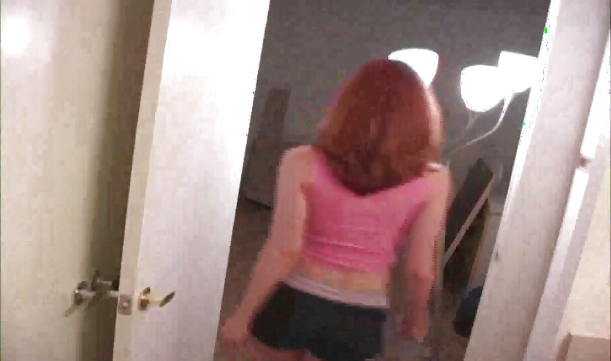Young redhead jerks off cock