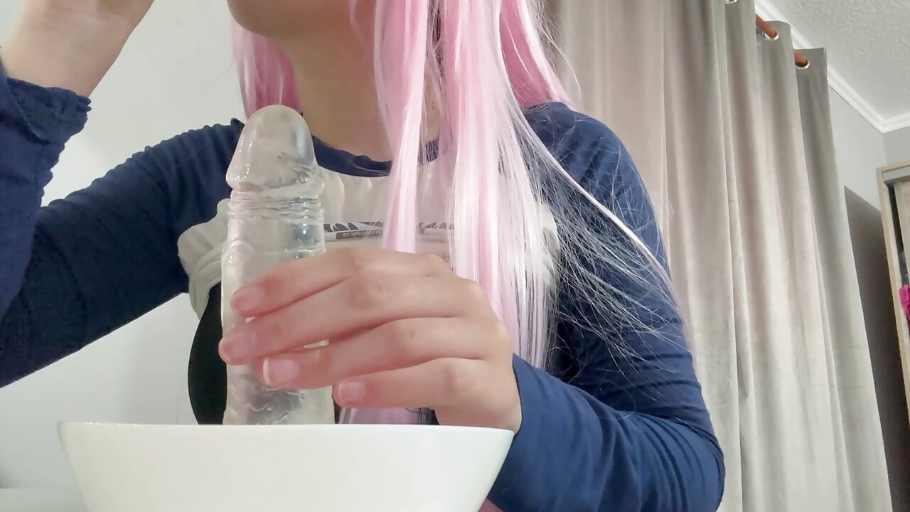 I suck a milky dildo and a lot of milk goes into my mouth
