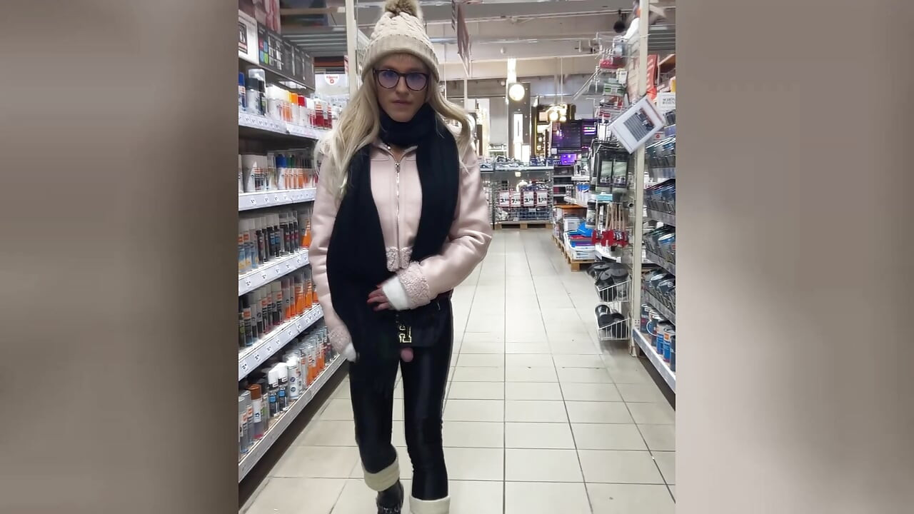 Public in a nylon open-crotch catsuit! Cute tranny girl cums while shopping!