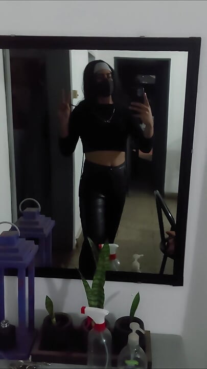 Crossdresser public walk wearing leather pants