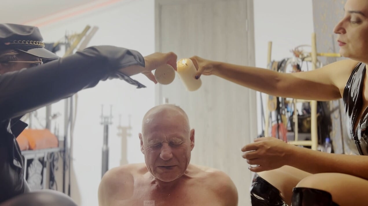 Hot waxing the bald head of the prisoner - Mistress Zeida DFC and Mistress Roberta OWK - Hot drips like my sadistic mind