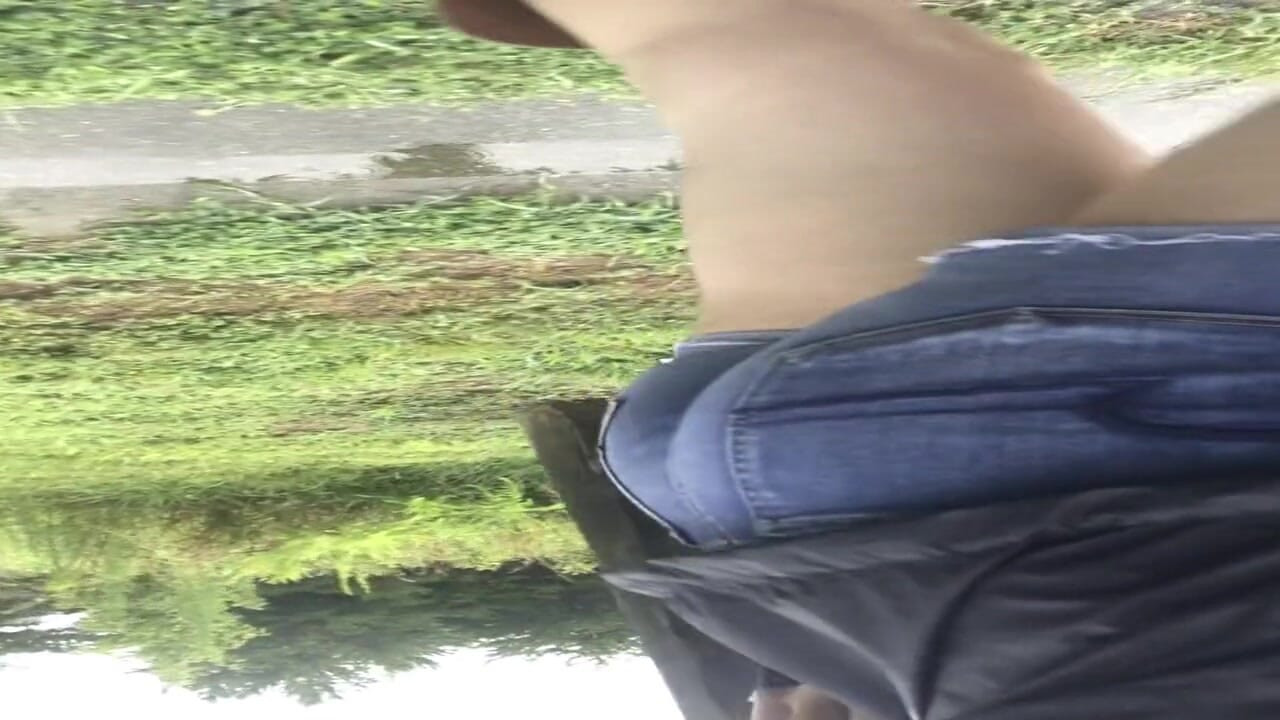 Rainy day walk in denim shorts and leather boots