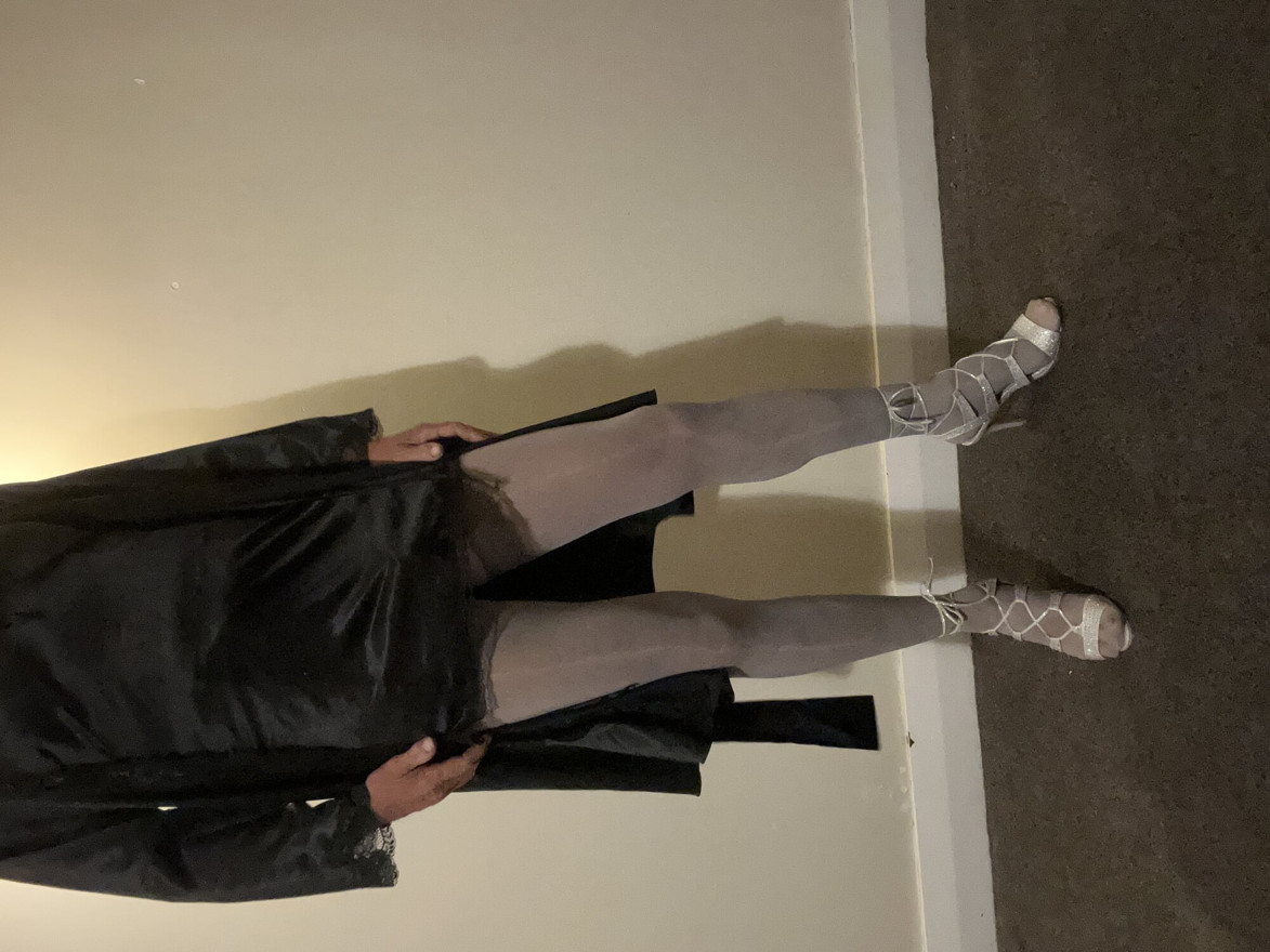 Sexy little black number stockings and high heels. I just love the fabric against my cock. A little teasing making me all hard