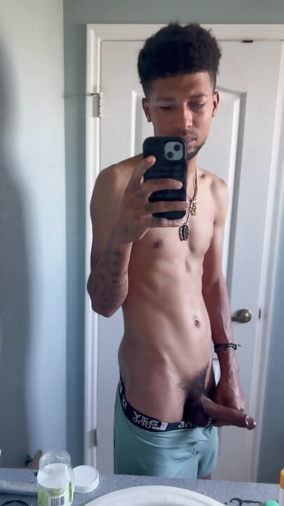 Modeling my huge dick in the mirror