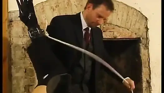 Tied up woman with clitoris piercings, sodomized by a stick