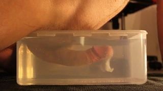 Cum inside plastic container with hot Water