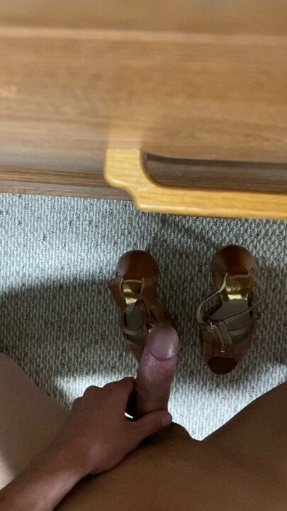 Cumming on a pair of heels