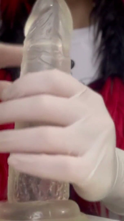 I play with the dildo in tight, white medical gloves | Clip 1