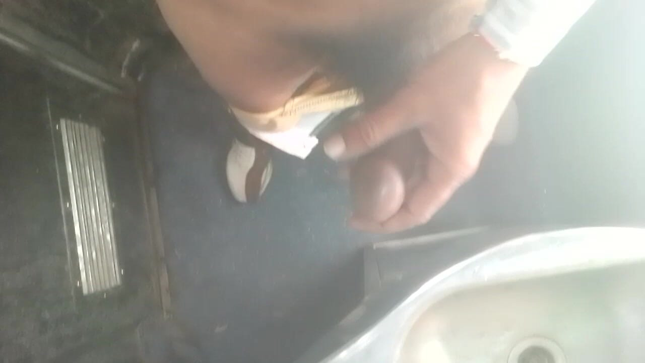 Young boy shaking his on a train