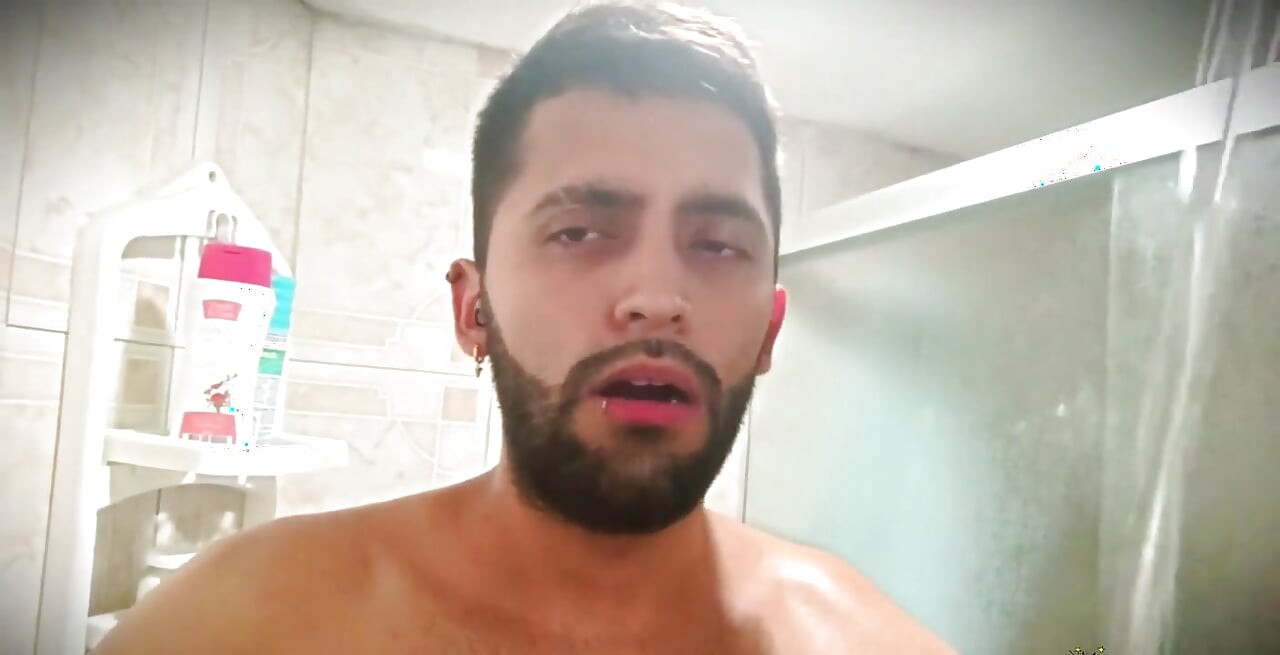 No hands water masturbation. Letting the stream of water fall on my big uncut Latino cock until it makes me cum.