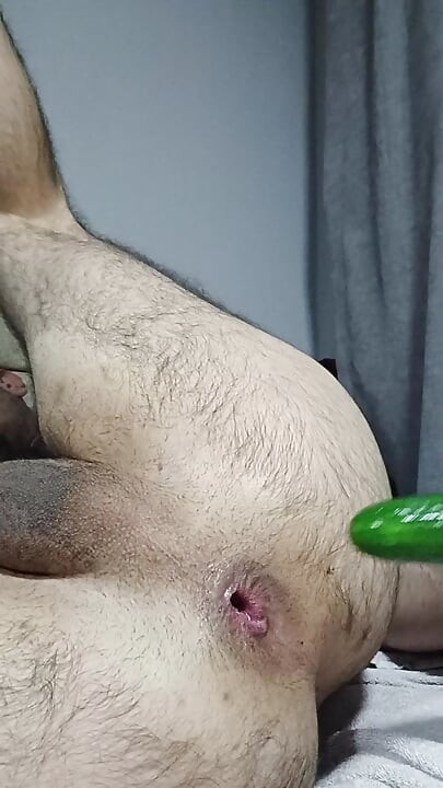 Hairy Turkish boy satisfies his hole with cucumber