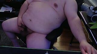 Fat guy plays with dick