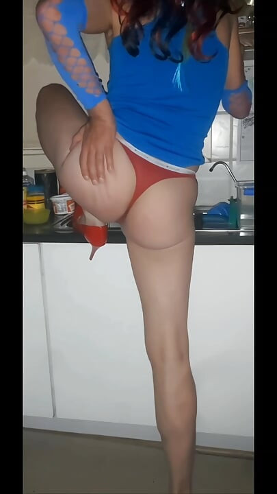 Removing my gym shorts to do some stretching in my tiny red G-string