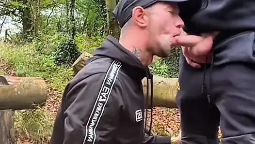 Scally lad bent over a log in the rain Trackies down, taking it  deep