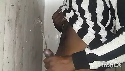 An 18-year-old boy masturbating in the bathroom of his house in memory of his madam masturbating in the bathroom of his house