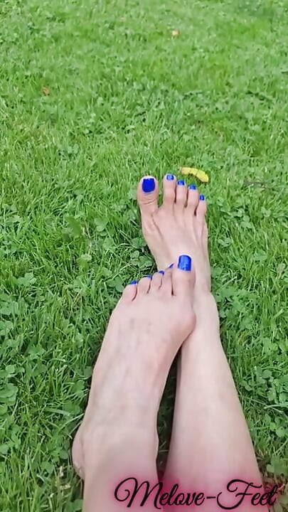 Melove Blue Nail Polish Showing her sexy feet on Grass