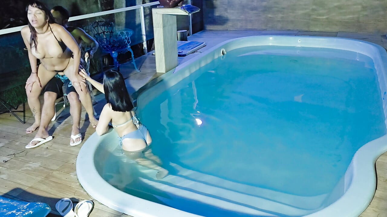 Caught in the Act! Two Brunettes Caught Masturbating in the Condo's Pool