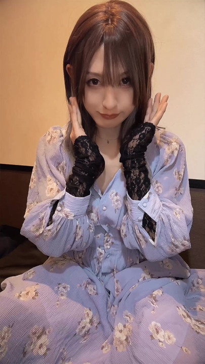 Video of a cute dressed woman masturbating quietly