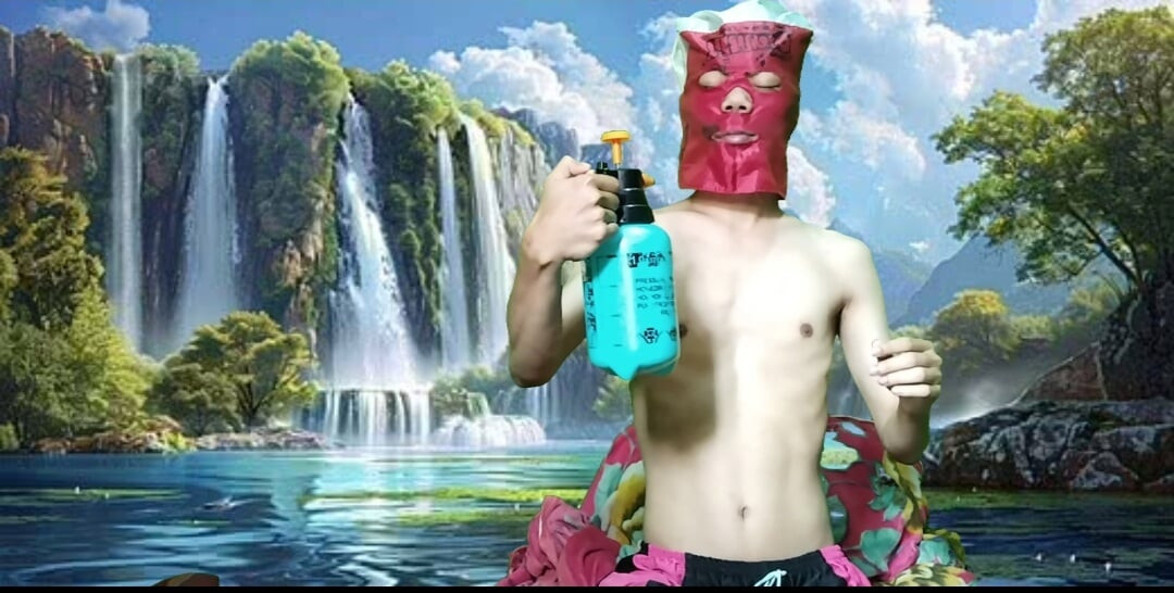 Masturbating with a dildo made from a bottle, used under a waterfall.