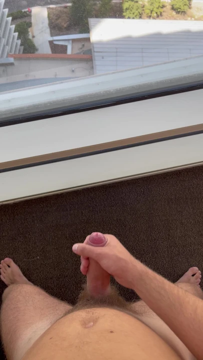 Quick cum on the windows like a boss