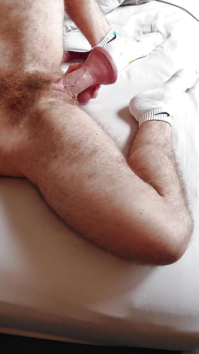 Ftm Boy Fucking His Hairy Pussy with a Huge Dildo and Squirting All Over the Bed