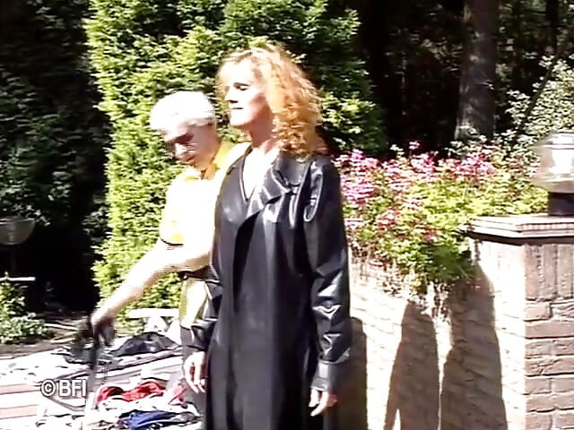 Leather woman gets dominated outdoor