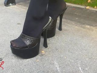 Lady L sexy walking with extreme black mules.