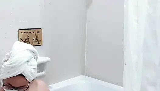 The charm of a black kebaya woman takes a shower and masturbates