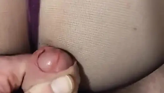 A Voyeuristic Stepmother in Tights Jerks off a Young Man and Receives His Sperm in Her Mouth.