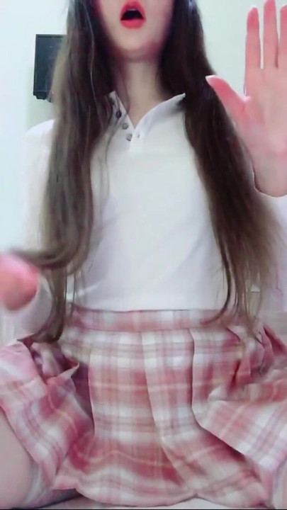 Epic moment from "TikTok Compilation Hot Girl: Brunette dances trends without underwear, leather skirt, stockings, thong,"