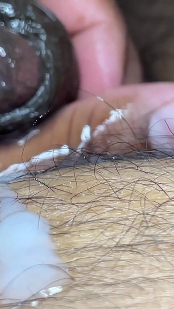Thrilling moment from "Guy masturbating by rubbing the head of the dick and fingering it like a pussy"