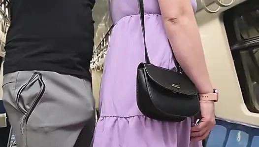Almost Seen by Subway Passengers When She Touch Stranger's Dick Through Pants