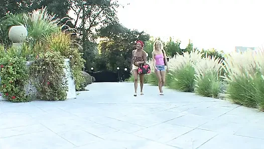 Tattooed ebony chick owns a white girl