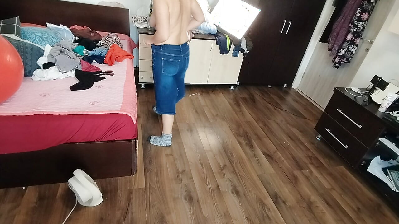 Amateur wife enjoys trying on clothes and cutting them.
