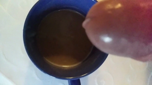 step dad puts milk in his coffee