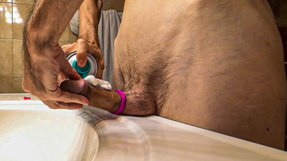 Skinny muscular amateur guy hard jerking off his huge uncut cock and put rubber band on his balls to take cumshot lot of sperm