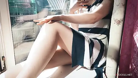 Lea in Sunshine Redhead Babe at the Window