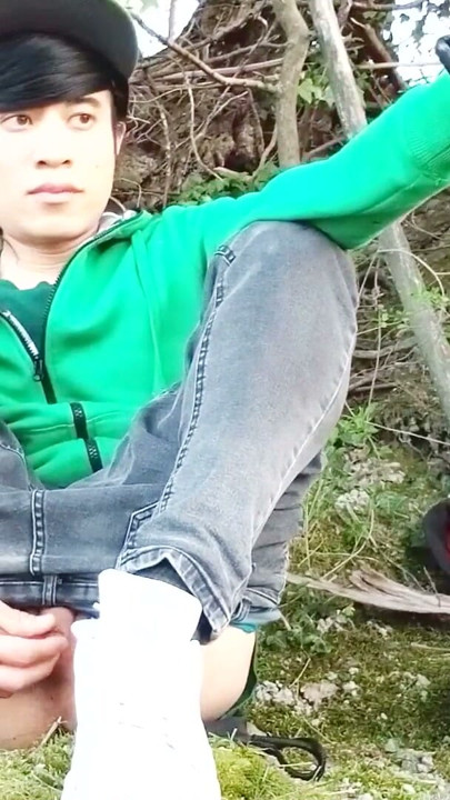 Risky masturbation outdoors a man's voice caught this cute gay twink with his balls hanging out, jerking off his uncut foreskin | Clip 1