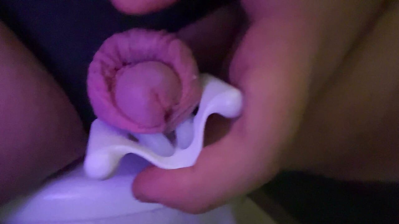 Day 2: Sitting in a public toilet and stretching my small uncircumcised penis with an extender.