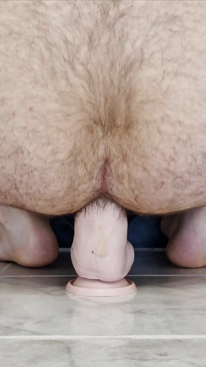 Fucking a thick dildo doggy
