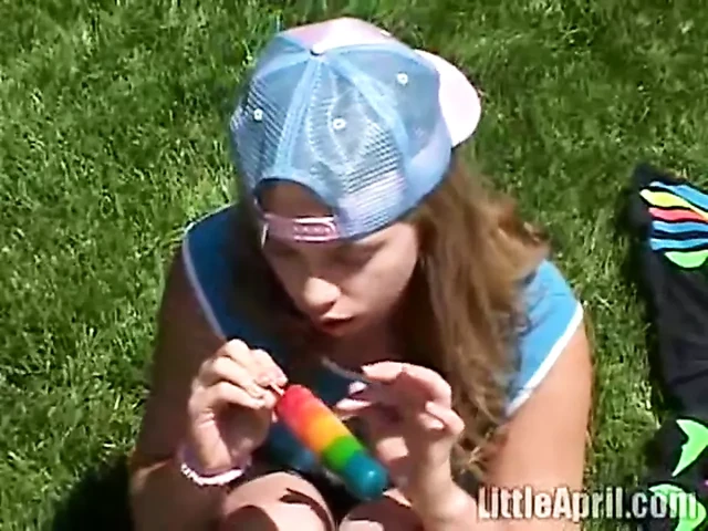 Teen rubbing her clit outdoors