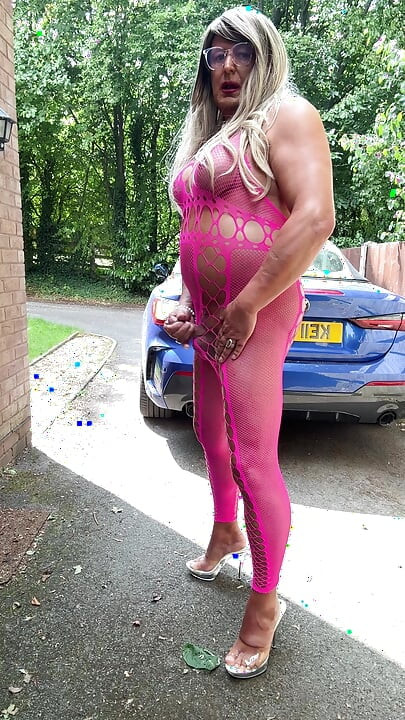 Sexy Crossdresser Kellycd2022's in pink fishnet catsuit and heels
