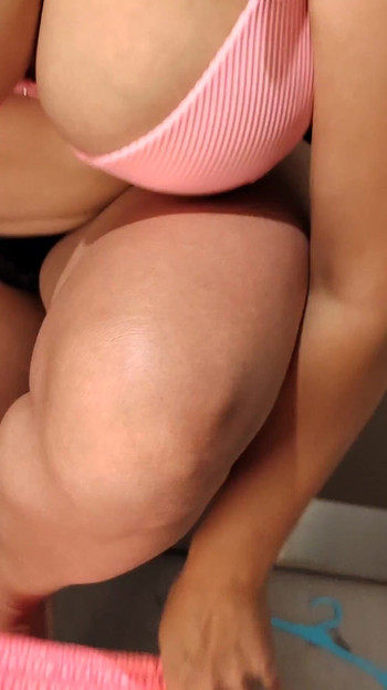 Jaw-dropping moment from "My stepsister allowed me to watch her try on swimsuits in the fitting room. She tries on a lot of"