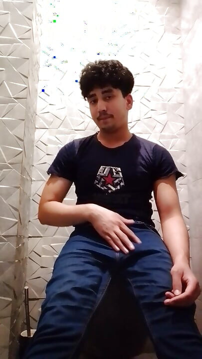 Indian Handsome Boy While His Hard Penis Is Erect and He Strokes His Hand Again in the Toilet Video
