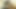 Uzun bacaklı sarışın orta yaşlı seksi kadının siyah bir adamla fotoğraf çekimi