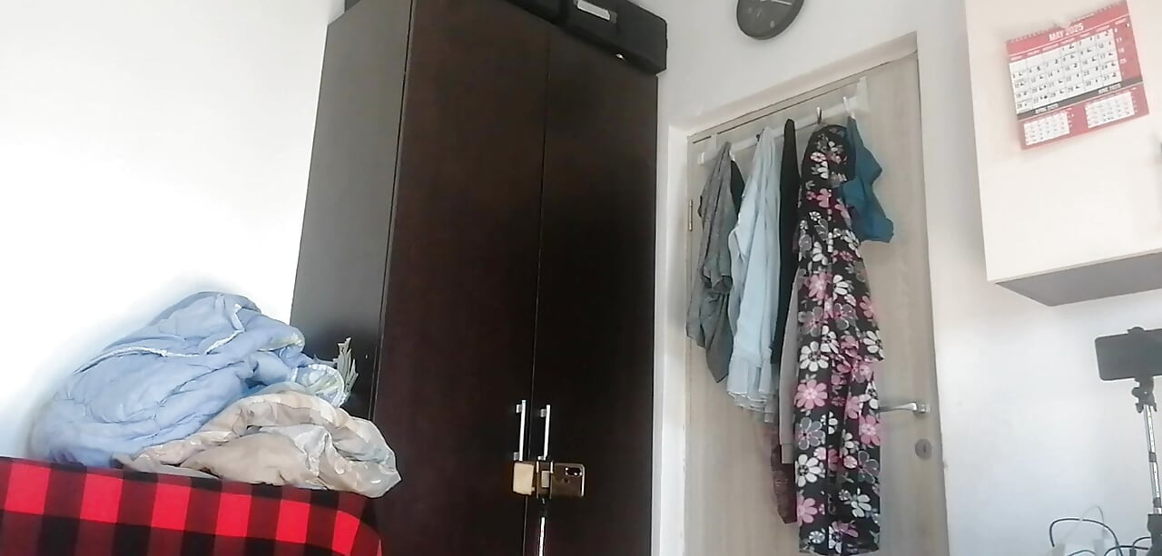 Amateur wife has fun trying on clothes and cutting them. Amateur wife vacuuming naked in the house.