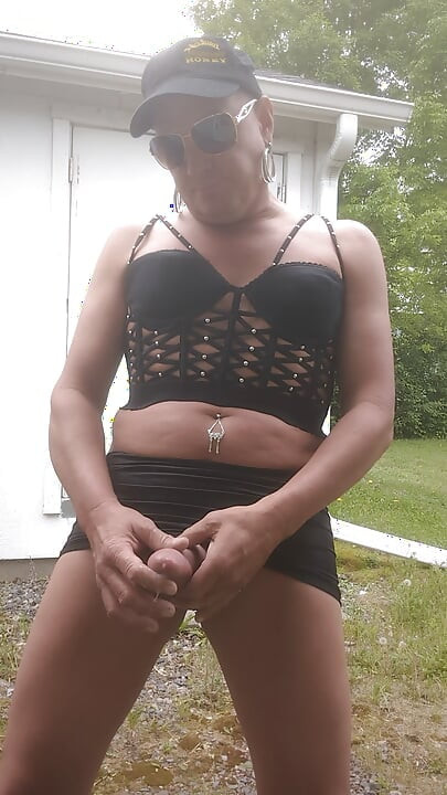 Mature crossdresser outdoors masturbation cum kicking